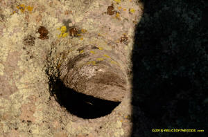 Sutter Buttes hole in rock.